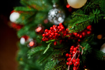 Beautiful Christmas tree with festive decor, close-up. New Year concept.