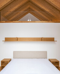 Obraz na płótnie Canvas Front view of bedroom with loft. No one inside