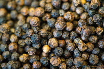 the textures background of black peppercorns