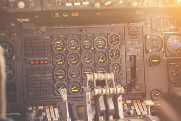 The cockpit of a passenger plane on a sunny day