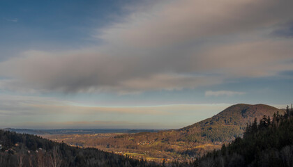 Winter sunrise near frosty Lysa hill in Beskydy mountains in blue sky morning