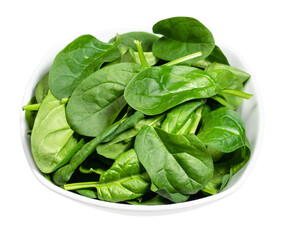 fresh leaves of Spinach leafy vegetable in white bowl cut out on white background