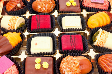 Assortment of chocolate praline candies close up