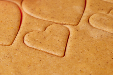 Unbaked cookies in the shape of heart and star for St. Valentines Day. Homemade pastry.