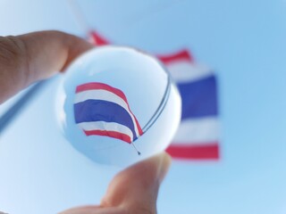 Fortune teller and prediction concept,Glass ball showing the national Thai flag, the meaning of the...