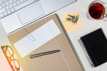 Folder with paper for notes, and office supplies, on desk. Concept of education.