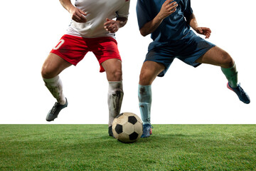 Fighting. Close up legs of professional soccer, football players fighting for ball on field isolated on white background. Concept of action, motion, high tensioned emotion during game. Cropped image.