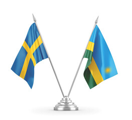 Rwanda and Sweden table flags isolated on white 3D rendering