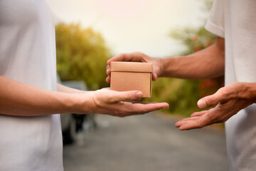 People giving giftbox concept happy new year, Valentine's day, Man giving giftbox to women