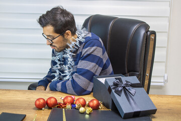 A person celebrating New Year alone, a businessman celebrating New Year alone, a person celebrating the new year.