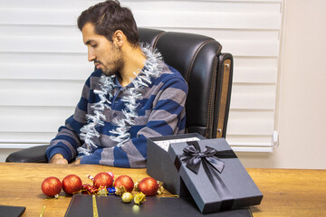 A person celebrating New Year alone, a businessman celebrating New Year alone, a person celebrating the new year.