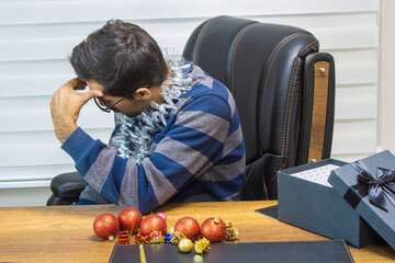 A person celebrating New Year alone, a businessman celebrating New Year alone, a person celebrating the new year.