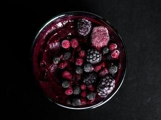 Smoothie bowl with frozen berries