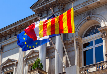 Avignon. National flags at city hall.