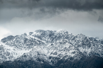 Fototapeta na wymiar Snow capped peak of Monte Grosso in Corsica