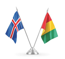 Guinea and Iceland table flags isolated on white 3D rendering