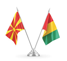 Guinea and North Macedonia table flags isolated on white 3D rendering