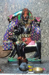 Foto auf Leinwand Beautiful view of the idol of Kaal Bhairav ​​Baba in Rajasthan © Pooja Prajapat