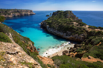 view of the beautiful beach "Caló des Moro" immersed in  the Mediterranean scrub  with crystal clear water, Majorca (Mallorca) Balearic Islands, Spain, Europe.