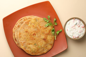 Aloo Paratha / Indian Potato stuffed Flatbread. Served with fresh curd