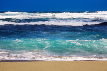 Panorama of rough Mediterranean sea with various shades of blue, seascape of north coast of Sardinia island, Italy, Europe.