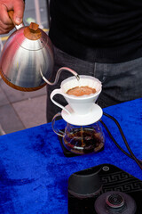 Barista is making American hand brewed coffee