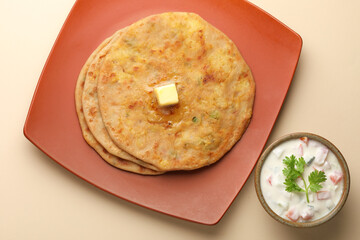 Aloo Paratha / Indian Potato stuffed Flatbread. Served with fresh curd