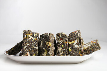 Instant Energy bar made with sesame seeds,flex seeds,jaggery and desi ghee.