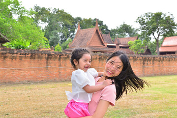 Little Girl and Mother at Ayutthaya Thailand