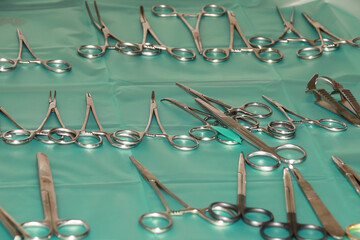 A tray of surgical steel instruments