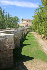 Bridge and church in Quintana del Puente, Spain	