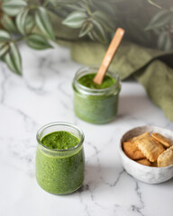 Green vibrant pesto with crackers