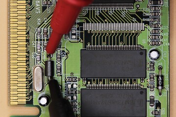 Circuit board testing electronic component close up