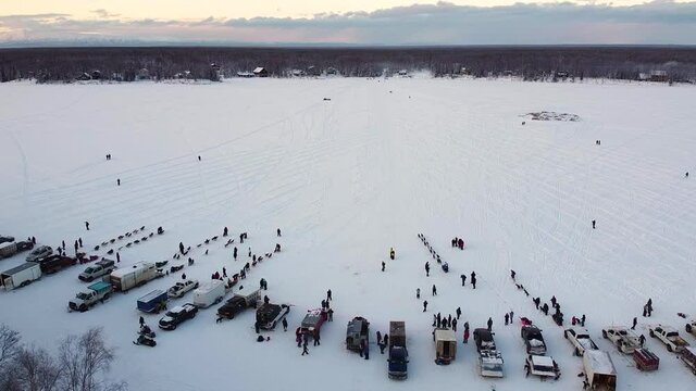 Alaskan Sled Dog Race, Mushers Start of Willow 300 - Aerial Drone Push Flyover