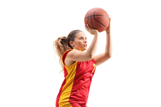 Woman basketball player jumping and shooting a ball