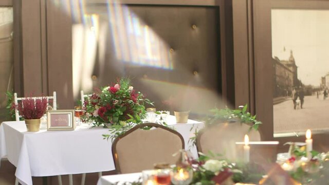 A wedding venue with some outstanding decoration in luxury style. Panning shot from left to right on the slider.