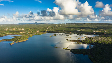 Aerial view above scenery of Curacao, Caribbean with ocean, coast, hills 