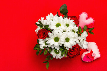 Bouquet of fresh flowers and felt heart for Valentine's day or Wedding