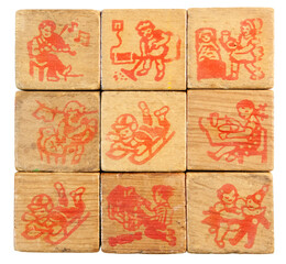 Worn and tattered vintage boys and girls activity blocks. Politically incorrect by today's standards.