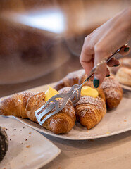 creamy brioches exhibited in a bar