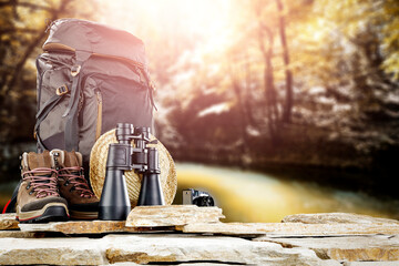 An expedition backpack in beautiful unknown landscapes - obrazy, fototapety, plakaty