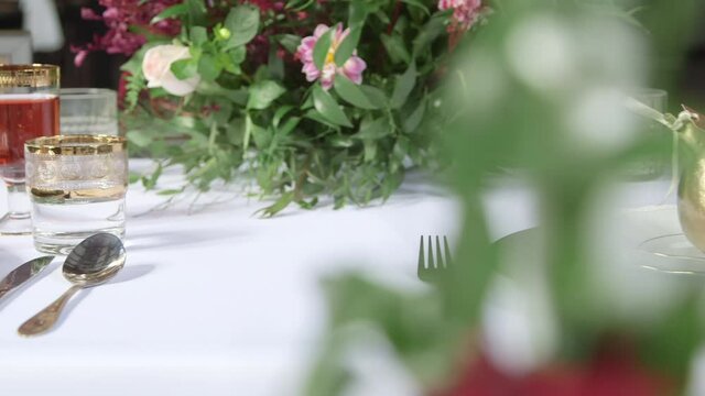 A wedding venue with some outstanding decoration in luxury style. Panning shot from left to right on the slider.