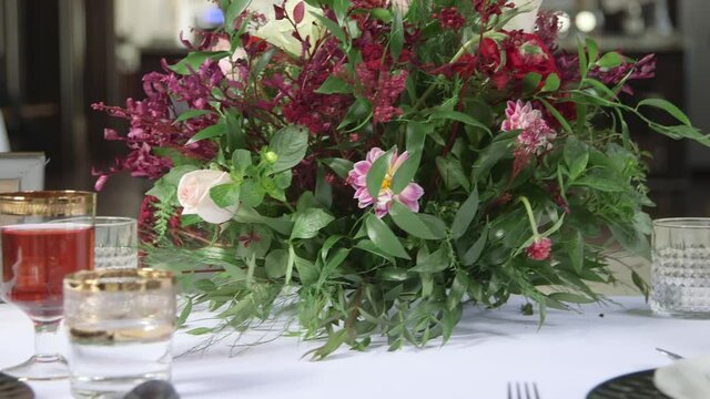 A wedding venue with some outstanding decoration in luxury style. Panning shot from left to right on the slider.