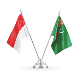 Turkmenistan and Indonesia table flags isolated on white 3D rendering