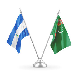 Turkmenistan and Nicaragua table flags isolated on white 3D rendering