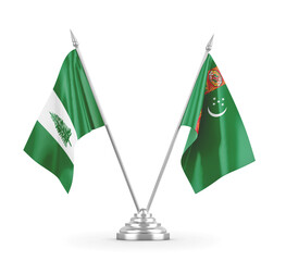 Turkmenistan and Norfolk Island table flags isolated on white 3D rendering