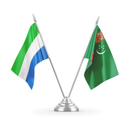 Turkmenistan and Sierra Leone table flags isolated on white 3D rendering