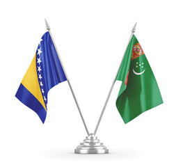 Turkmenistan and Bosnia and Herzegovina table flags isolated on white