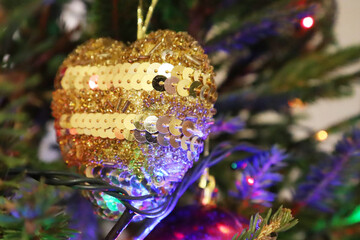 Christmas tree with new year decorations. New Year celebration. Selective soft focus. Background for postcards