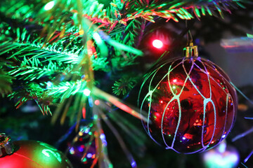 Christmas tree with new year decorations. New Year celebration. Selective soft focus. Background for postcards